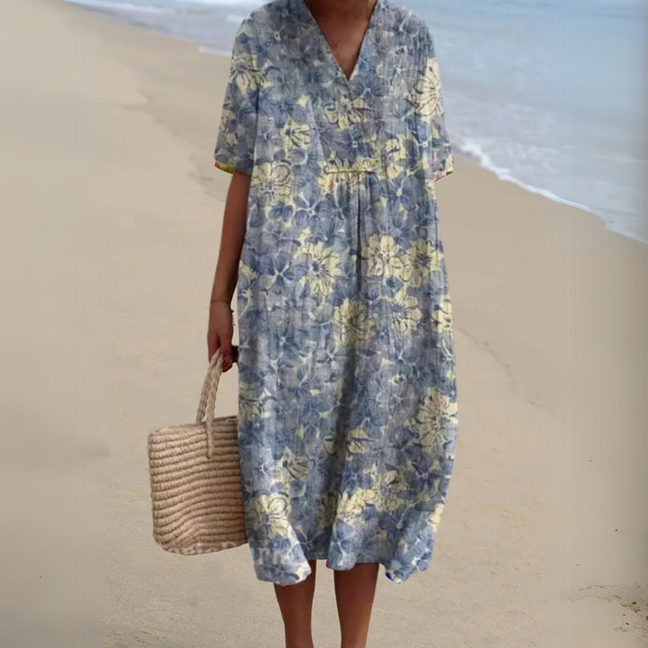 Casual chic women's multicolour V-neck dress, floral print, perfect for summer wear.