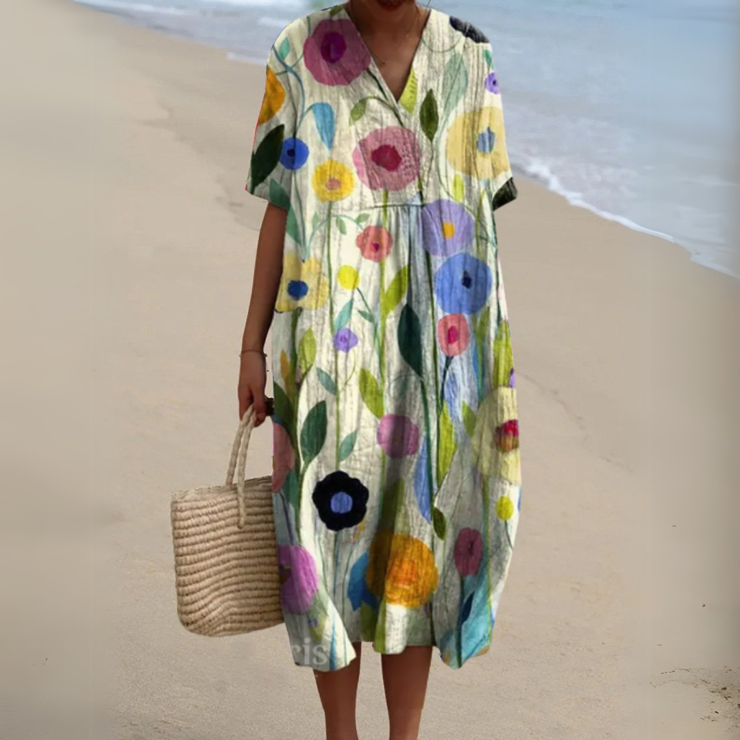 Stylish women's summer dress, multicolour floral V-neck, flowy midi for any occasion.