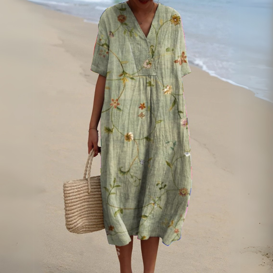 Women's stylish flowy midi dress, multicolour floral V-neck design, summer ready.