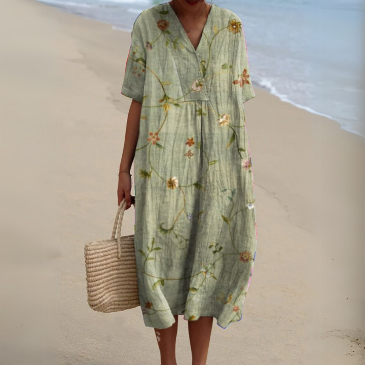 Women's stylish flowy midi dress, multicolour floral V-neck design, summer ready.