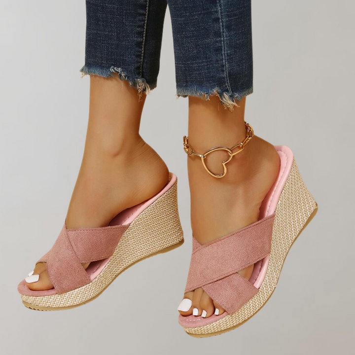 Women's orthopedic wedge sandals with crisscross straps, perfect for stylish comfort and foot support this summer.