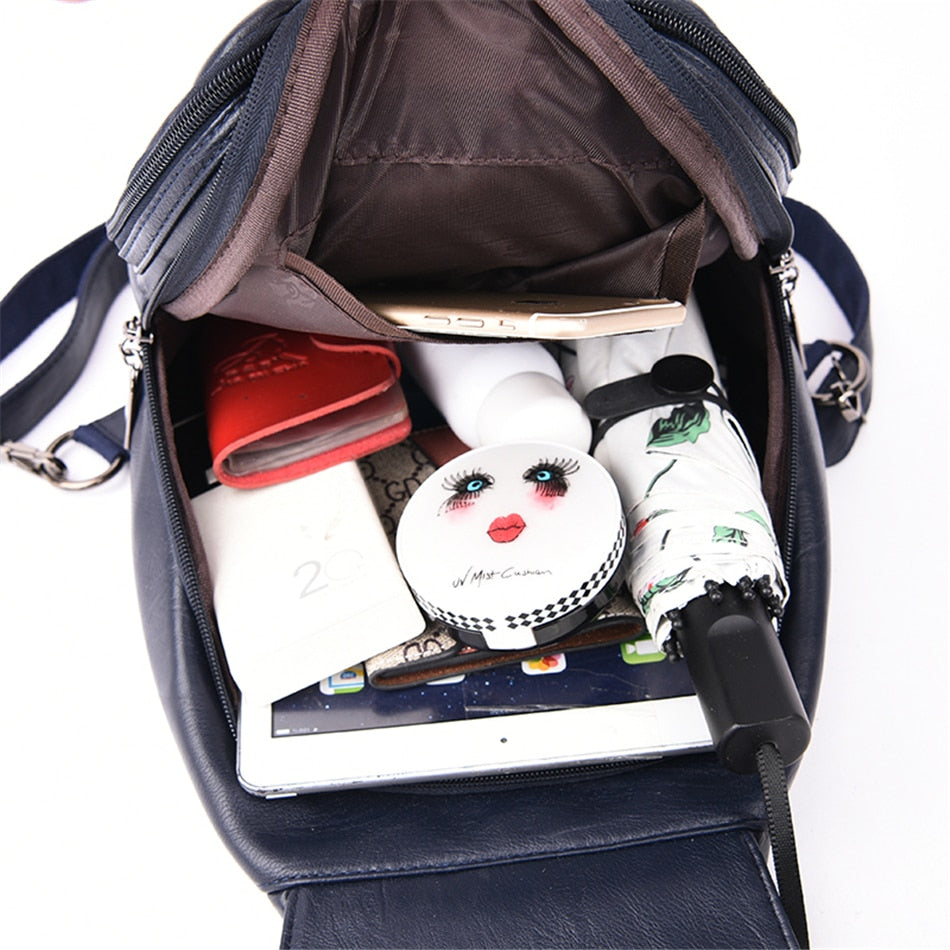 Brown leather water-resistant backpack for women, a premium and practical daily bag.
