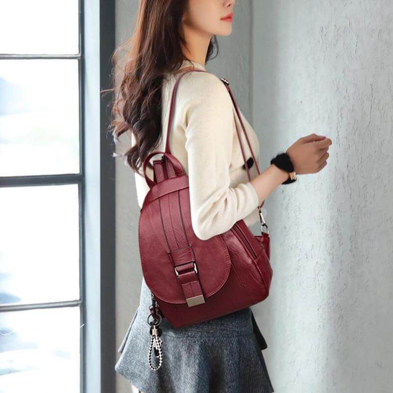 Fashion-forward water-resistant women's leather backpack for work, travel, and daily use.