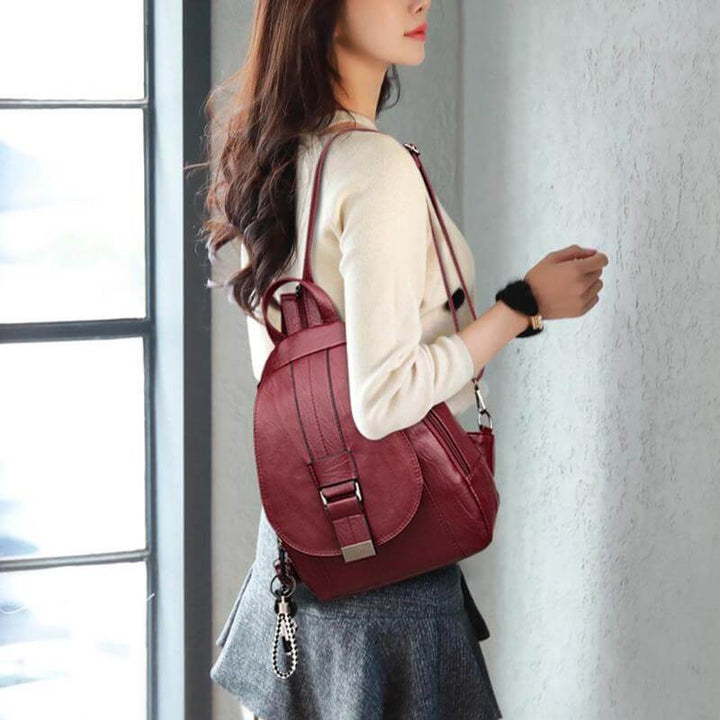 Fashion-forward water-resistant women's leather backpack for work, travel, and daily use.