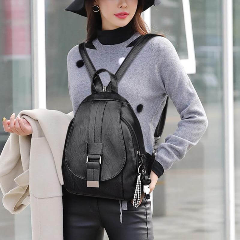 Stylish water-resistant genuine leather backpack for women, a versatile daily fashion accessory.
