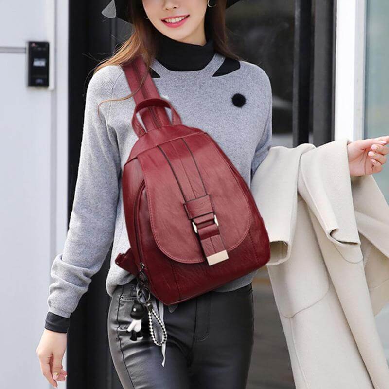 Practical women's anti-theft water-resistant leather backpack, great for travel and work.