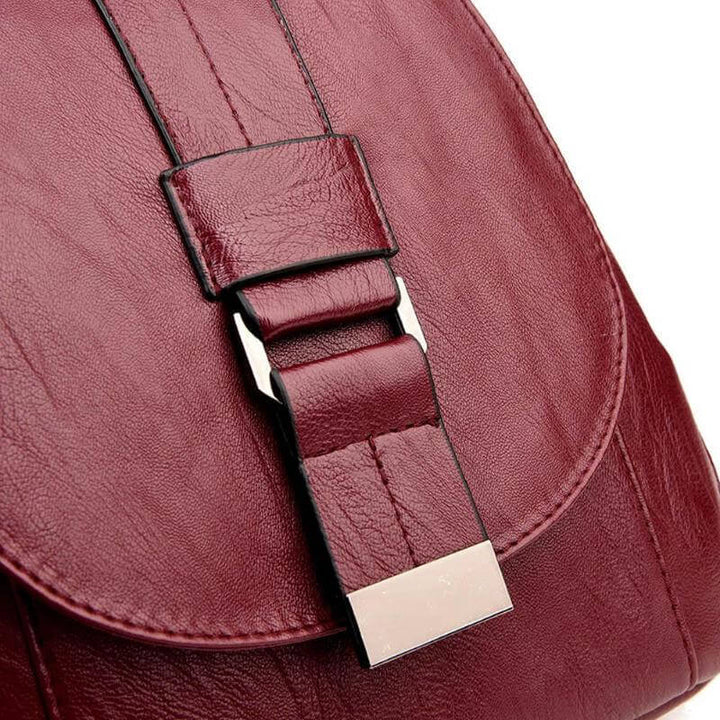 Chic women's anti-theft leather backpack, water-resistant for secure daily commutes.