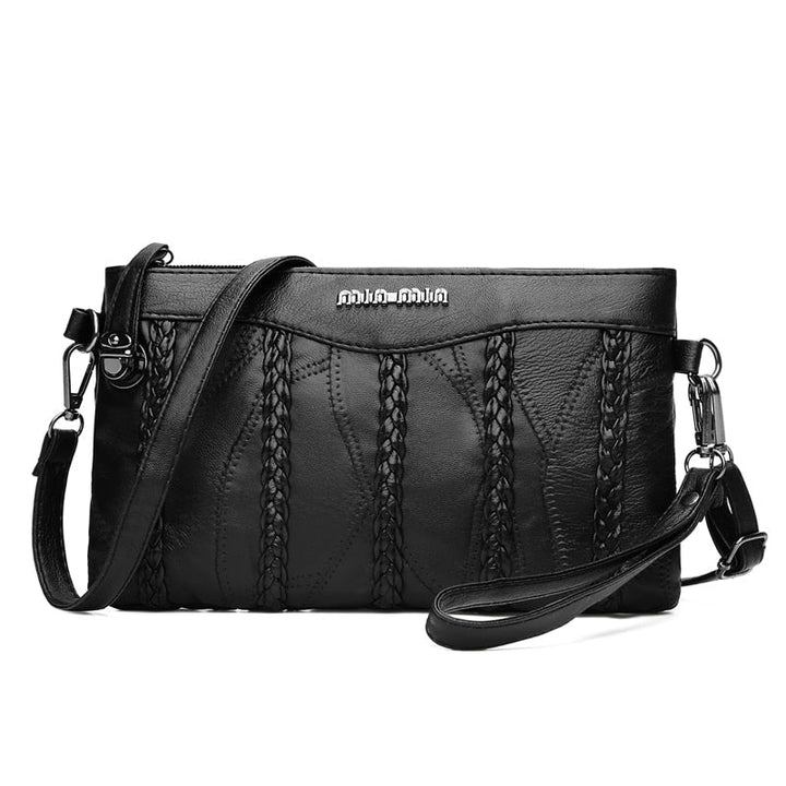 Stylish women's PU leather crossbody clutch. Versatile evening bag or daily purse with spacious interior.