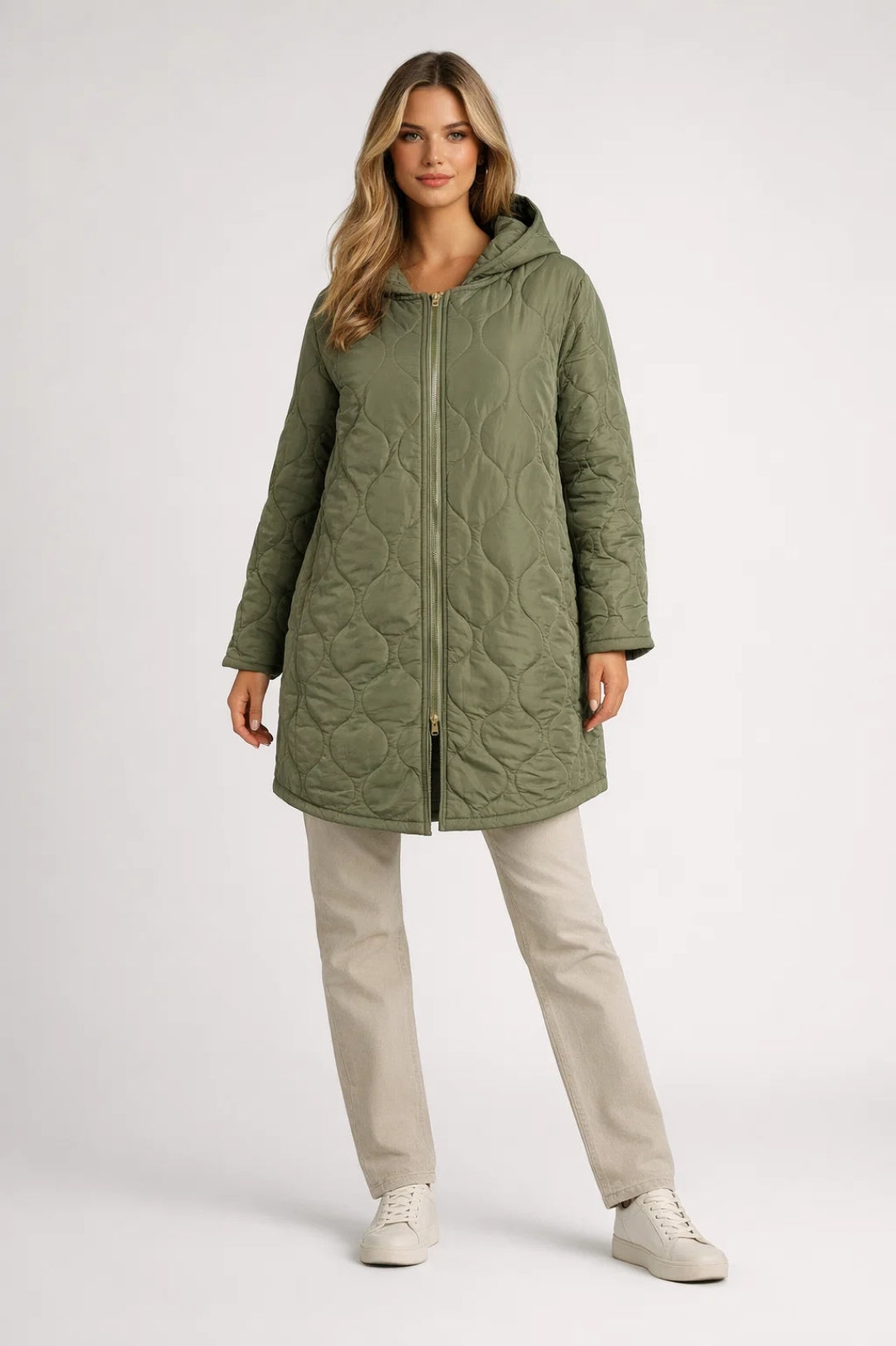 Stylish women's quilted hooded coat. Knee-length design, perfect for autumn & winter fashion. Comfortable casual outerwear.