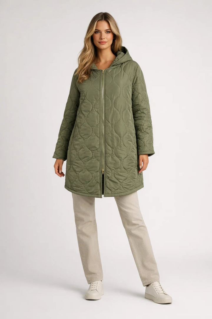 Stylish women's quilted hooded coat. Knee-length design, perfect for autumn & winter fashion. Comfortable casual outerwear.