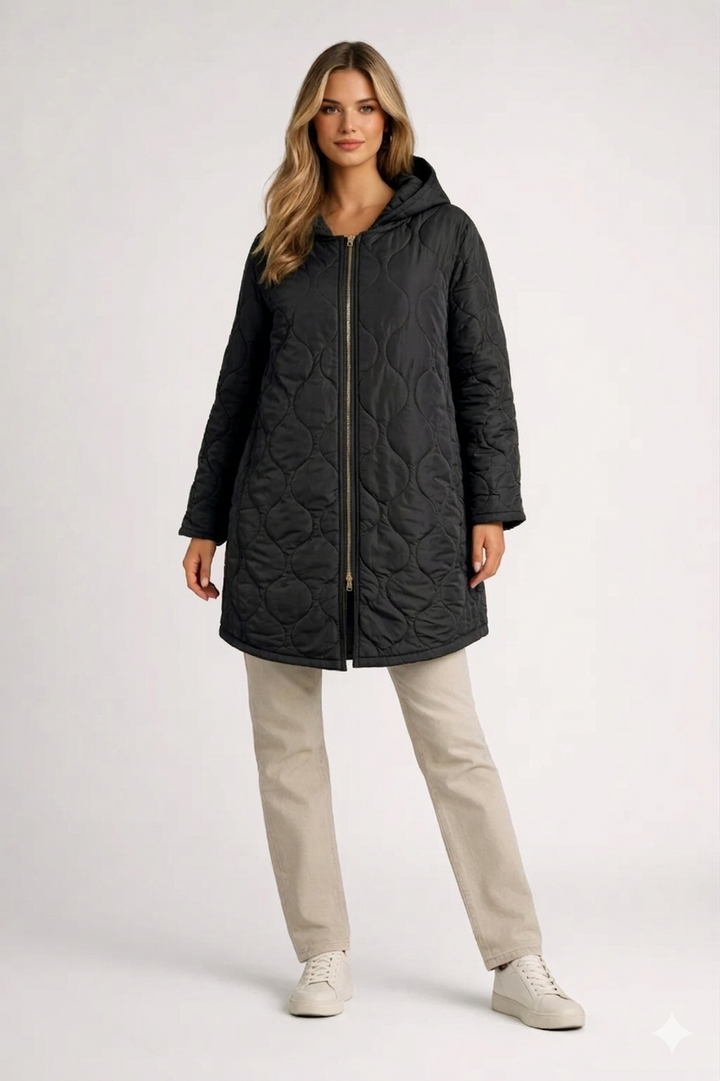 Ladies' knee-length quilted hooded jacket with zipper closure. Ideal stylish and comfortable fall & winter outerwear.