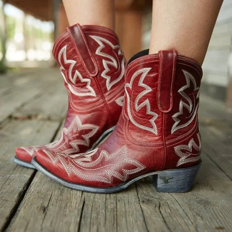 Comfortable red women's Western cowboy boots featuring detailed embroidery, perfect for a stylish autumn look.