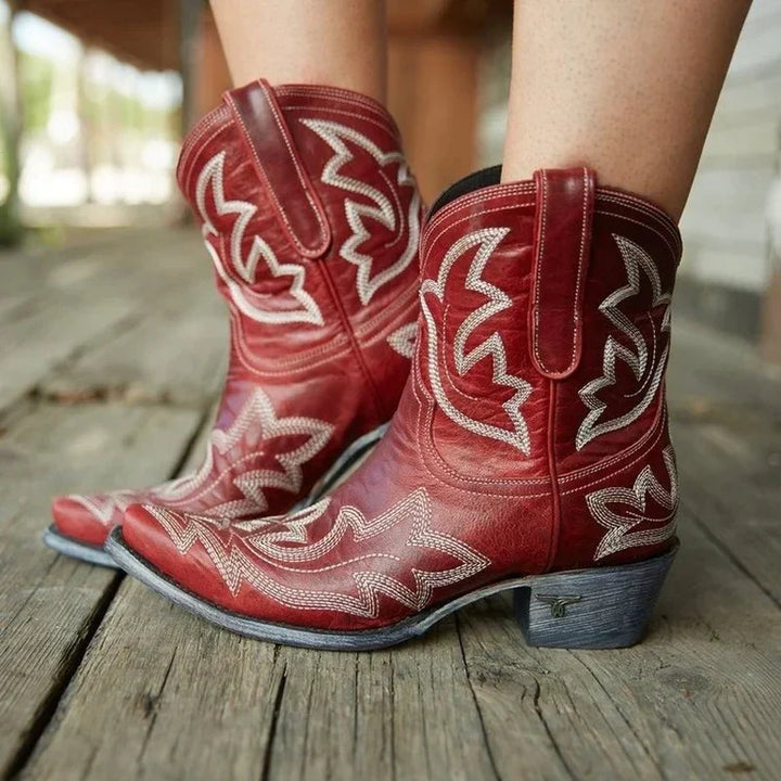 Comfortable red women's Western cowboy boots featuring detailed embroidery, perfect for a stylish autumn look.