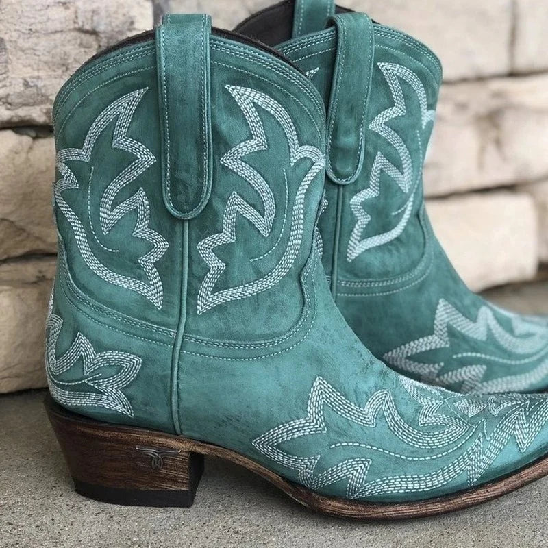 Fashionable women's embroidered red cowboy boots. Western style footwear offering comfort for autumn & winter.