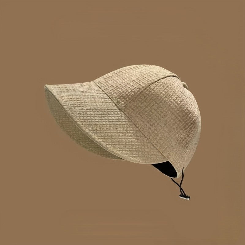 Practical women's sun hat, offers excellent UPF sun protection, features an adjustable drawstring for windy days.