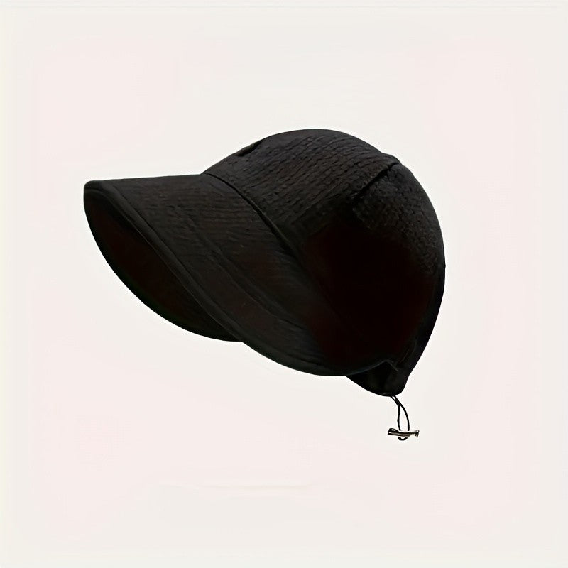 Chic women's summer hat, wide brim, and adjustable drawstring, ideal fashion accessory for sun protection & travel.