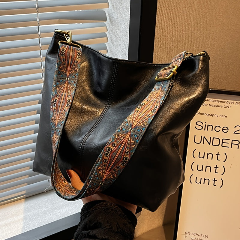 Versatile women's tote handbag, a sophisticated fashion accessory with a spacious interior and elegant design.