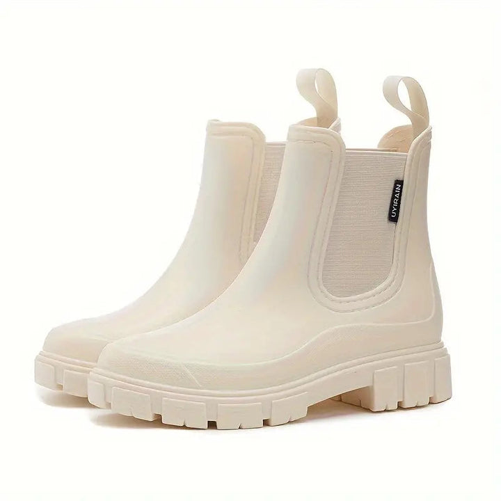 Fashionable women's waterproof rain boots. Stay dry & chic in wet weather with these comfortable, non-slip ankle boots.