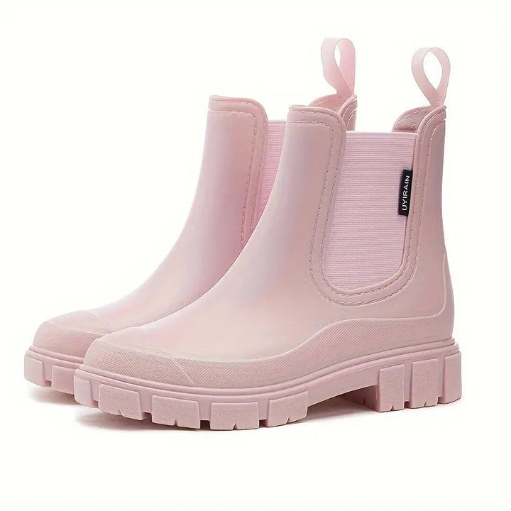 Chic women's waterproof rain boots, ideal for wet weather. Stylish, comfortable, non-slip outdoor footwear for women.