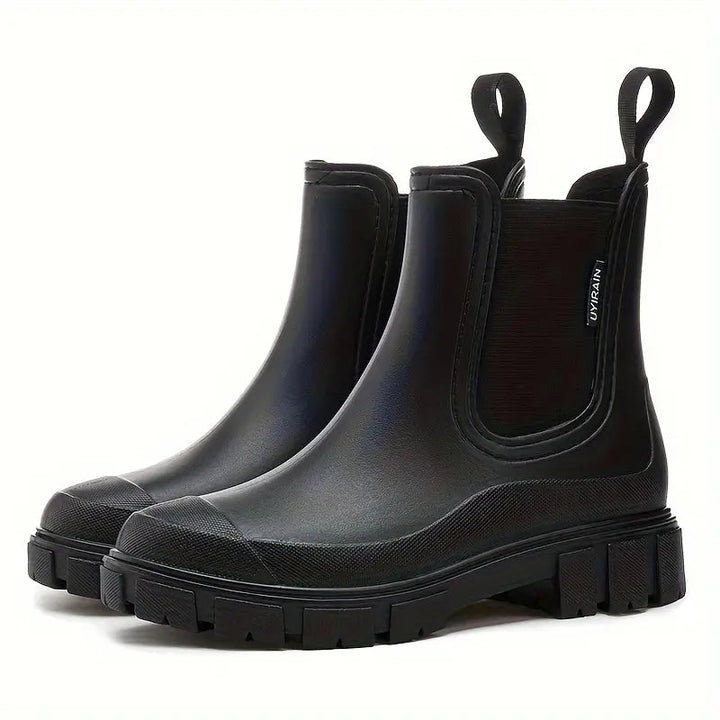 All-weather women's waterproof rain boots. Keep feet dry & stylish; comfortable, non-slip design for outdoor use.