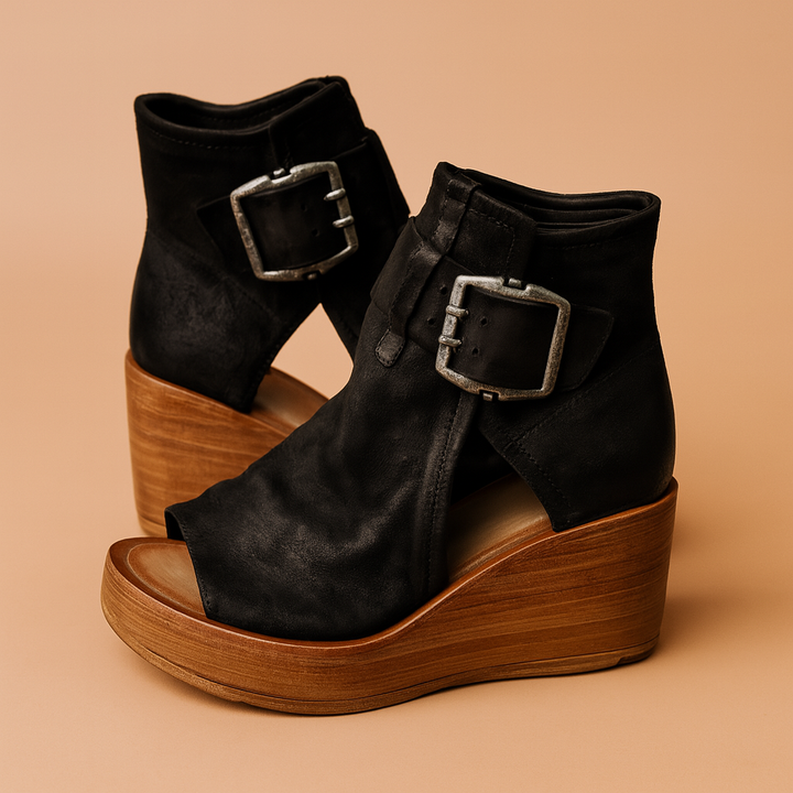 Stylish women's wedge sandals with a large buckle design, perfect for summer fashion & comfort.
