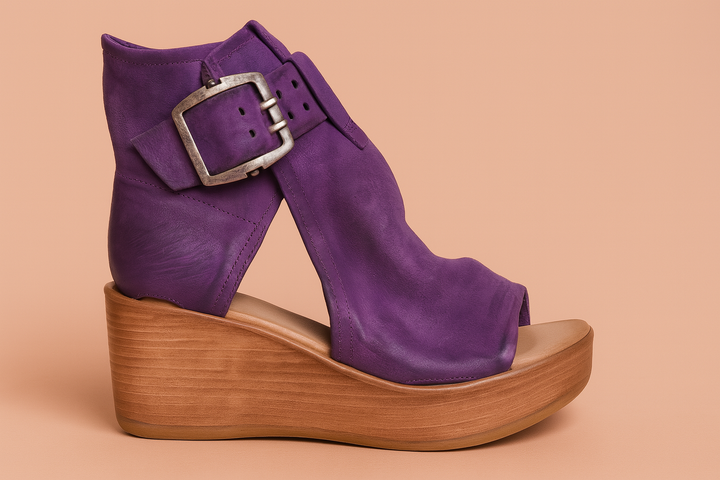 Chic women's wedge heel sandals featuring a modern large buckle, offering elegant style & comfort.