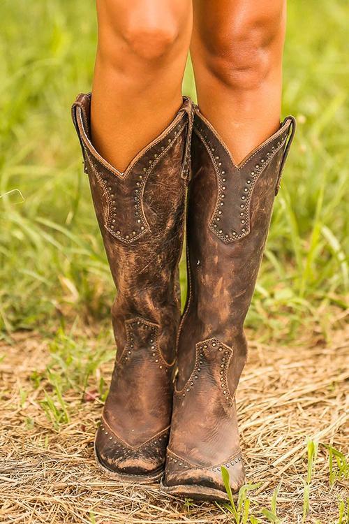 Stylish women's Western cowboy boots. Trendy ladies' fashion footwear for versatile casual or everyday wear.