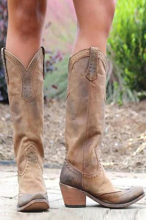 Classic leather women's Western cowboy boots. Comfortable & fashionable ladies' footwear, perfect for any occasion.