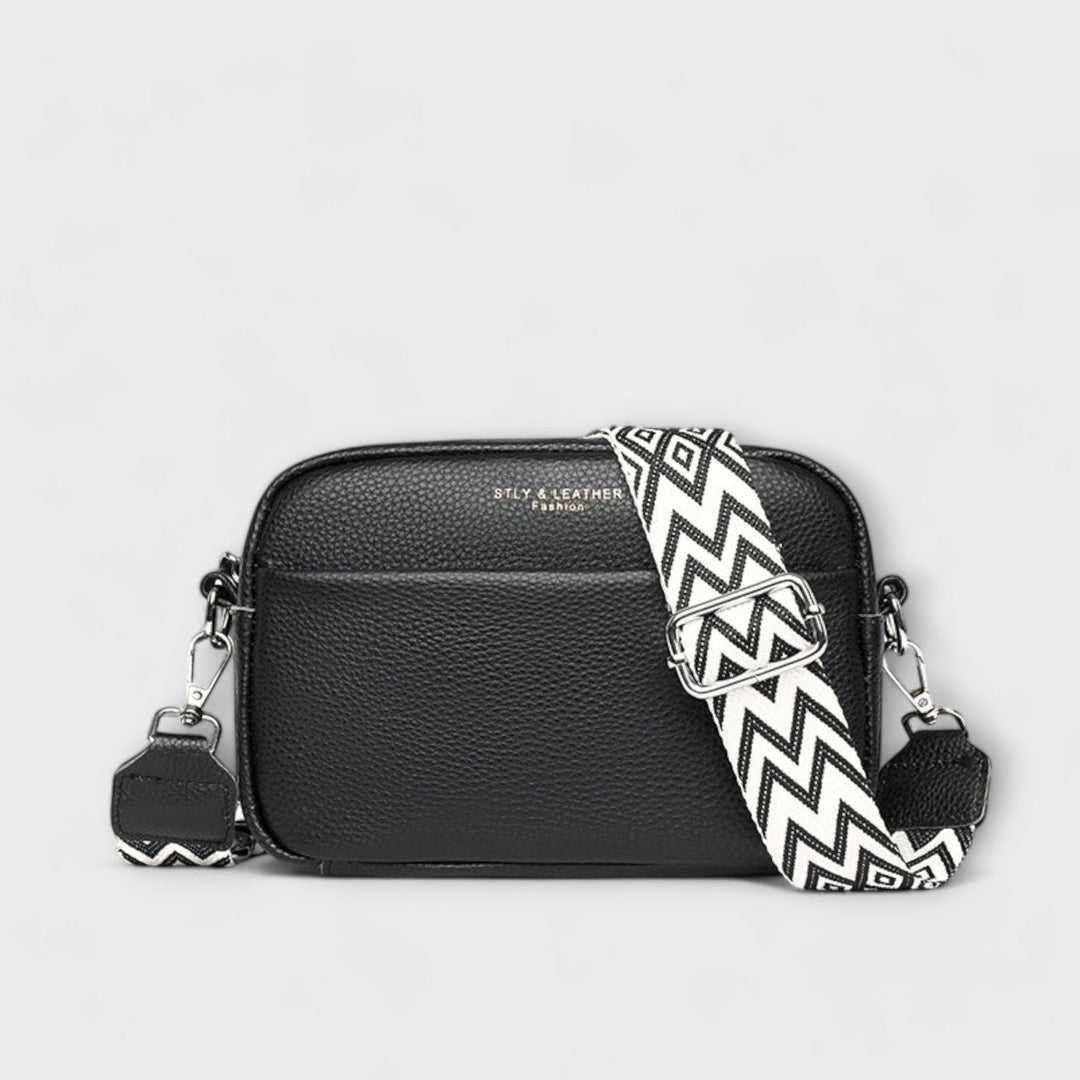 Compact women's textured crossbody mini bag, perfect for daily use with a stylish statement strap.