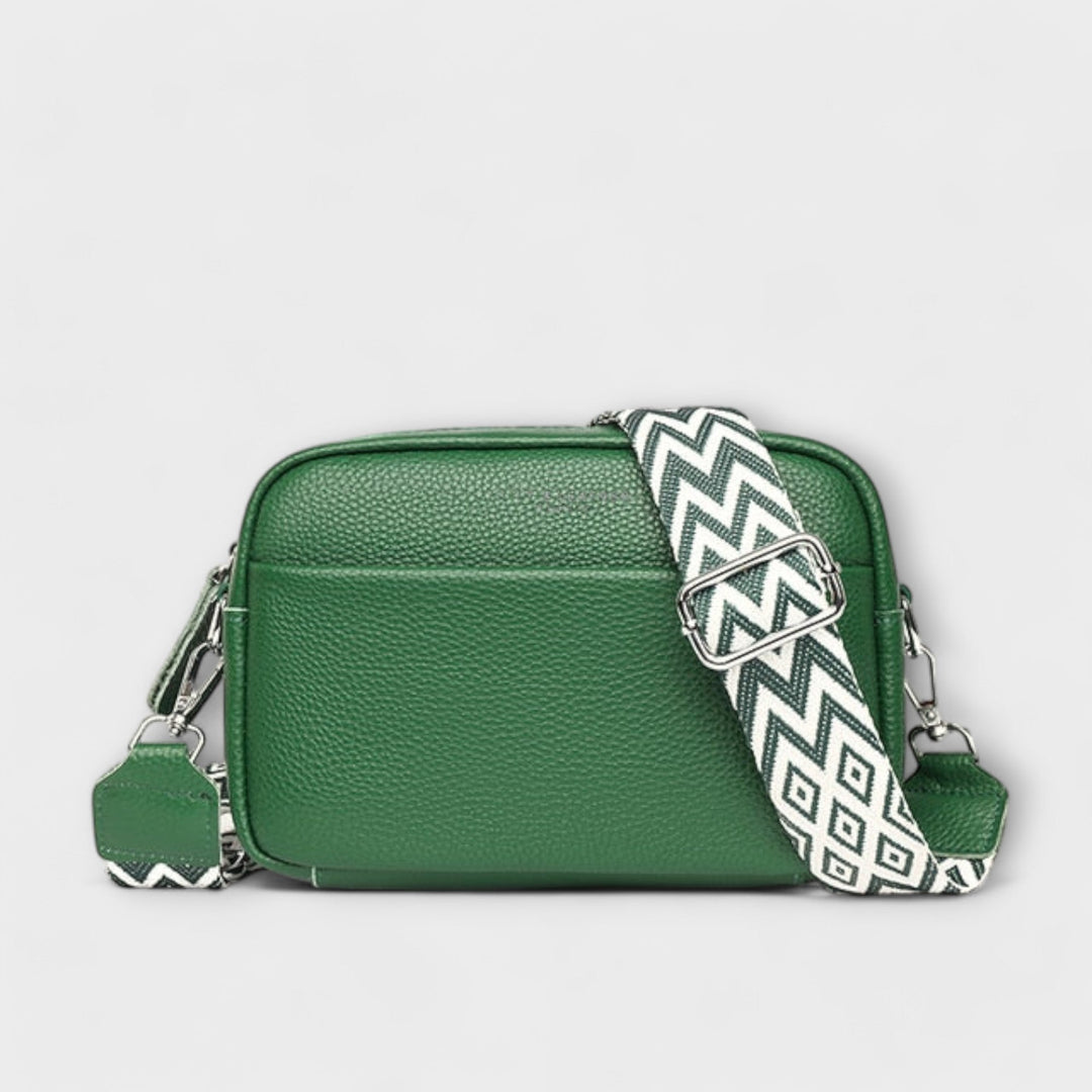 Elegant women's mini shoulder bag, textured design with a unique statement strap, a fashionable crossbody.
