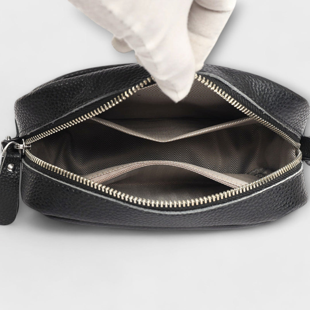 Detailed shot of the textured material on a women's mini crossbody shoulder bag, showcasing quality.
