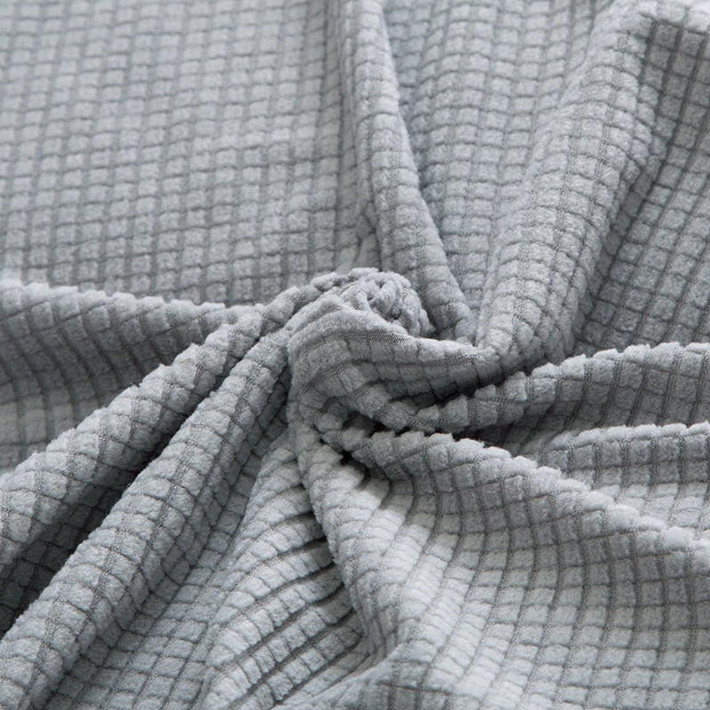 Before and after: sofa transformed with a textured stretch, non-slip, machine washable cover