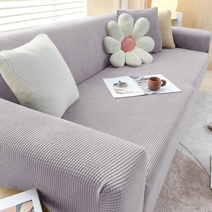 Machine washable textured sofa cover in a neutral tone, ideal for busy households