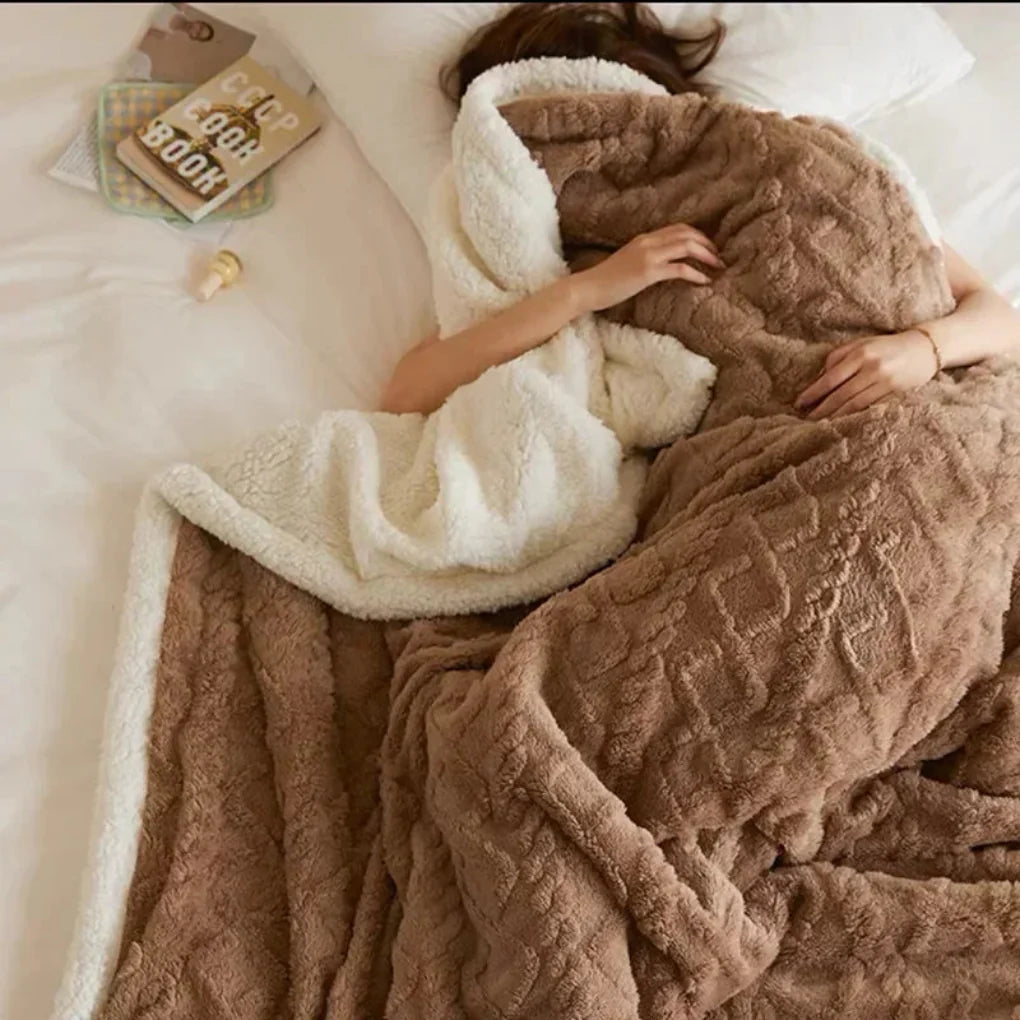 Thick polyester winter blanket for ultimate warmth. Neutral, cozy design for bedroom or living room comfort.