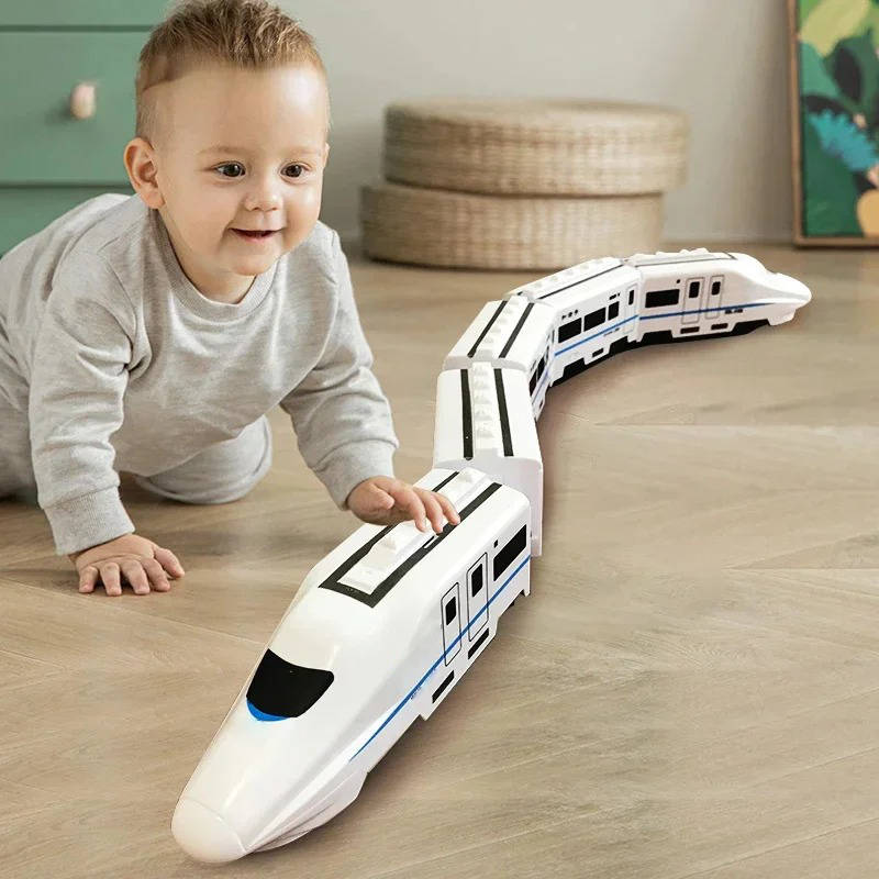 Kids' interactive train set with lights & sounds, promoting motor skills & educational play for toddlers. Bump & Go fun!