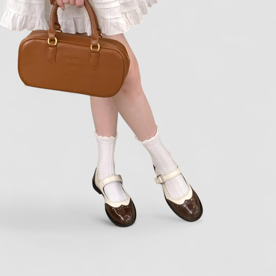 Stylish women's orthopedic Mary Jane shoes, Tracy London two-tone design with a classic buckle for comfortable wear.