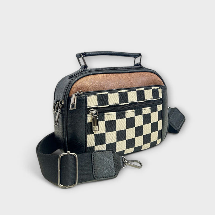 Stylish women's black crossbody bag, versatile for casual wear, a chic shoulder bag