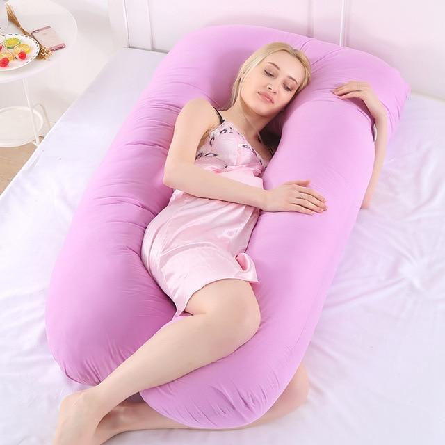 Versatile U-shaped maternity pillow for pregnancy sleep comfort, prenatal care, and postpartum nursing support.
