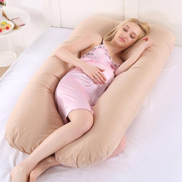 Supportive full body U-shaped pregnancy pillow for women's health, promoting better sleep & comfort.