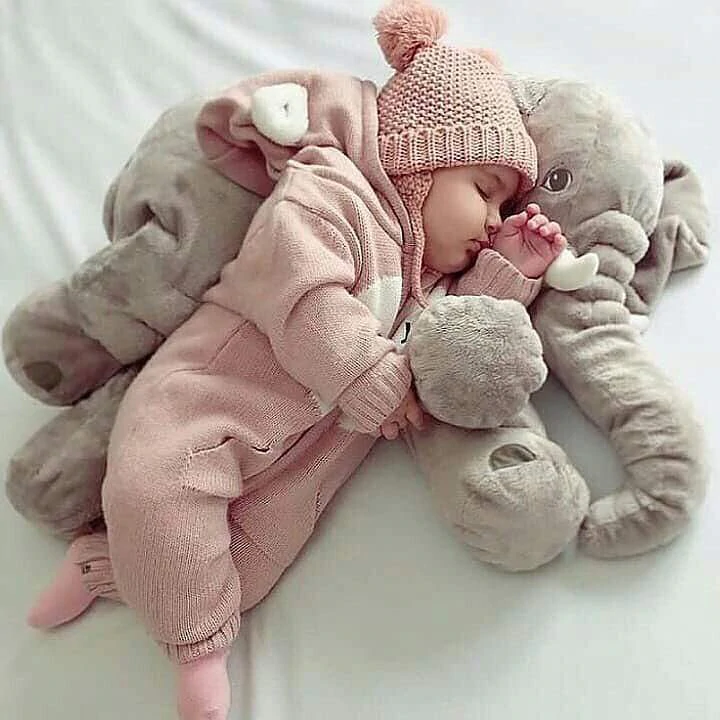 Soft elephant baby pillow, ideal for comforting cuddles in any nursery or child's room.