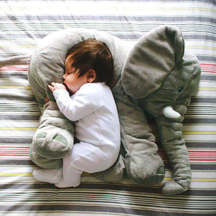Comfortable baby elephant pillow, ultra-soft plush toy for infants and playful kids' rooms.