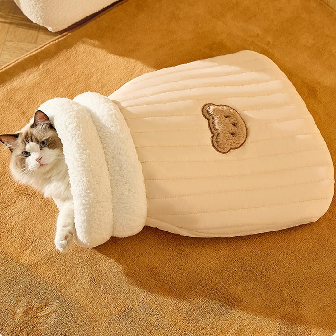 Sleeping bag style pet bed for cats, featuring a plush, ultra-soft interior for warmth and security.