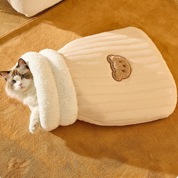 Sleeping bag style pet bed for cats, featuring a plush, ultra-soft interior for warmth and security.