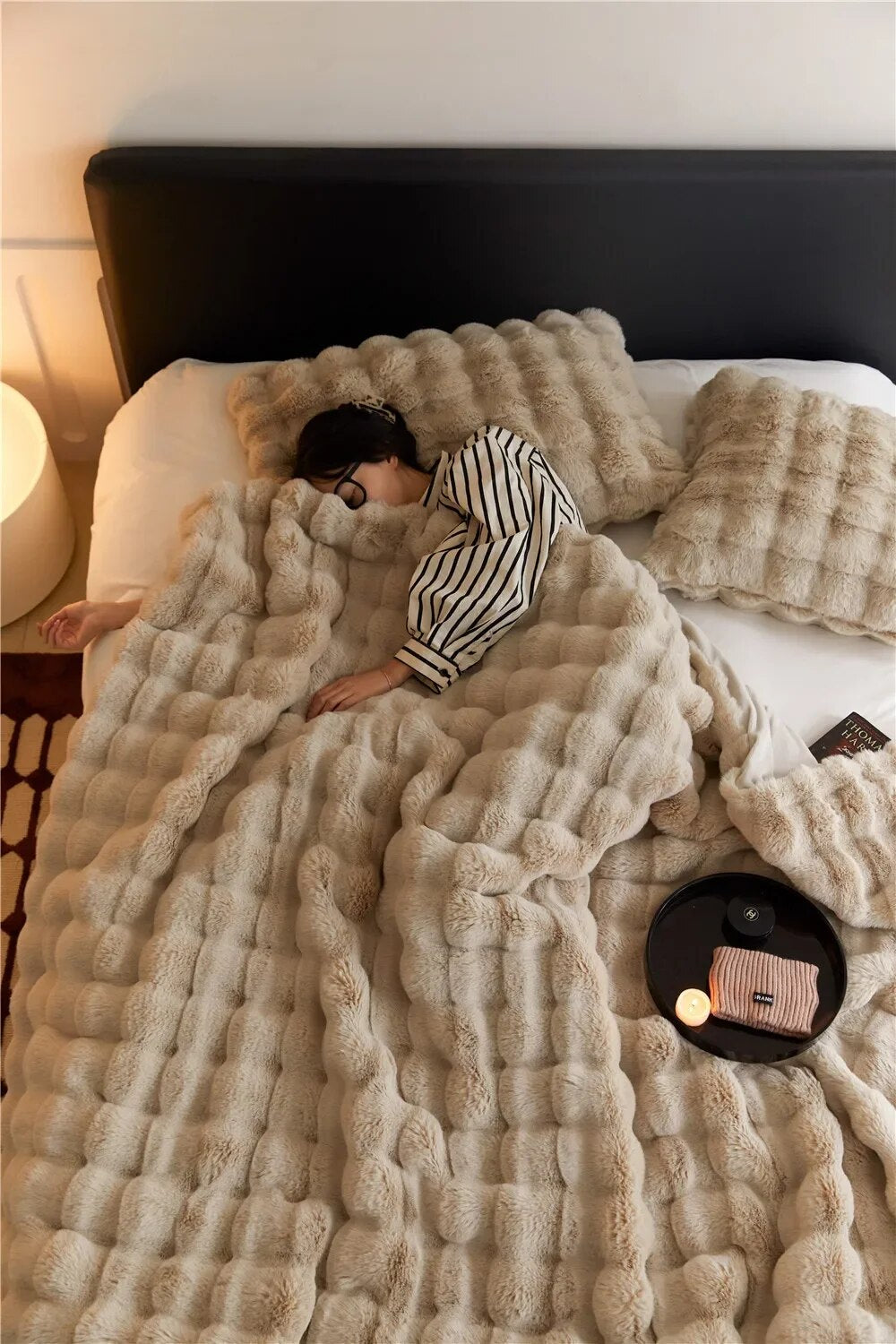 Ultra-soft plush throw blanket for cozy warmth. Perfect for living room & bedroom comfort.
