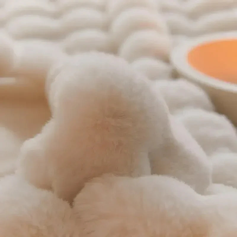Close-up of the plush texture of the ultra-soft throw blanket, showcasing its cozy warmth & luxury.