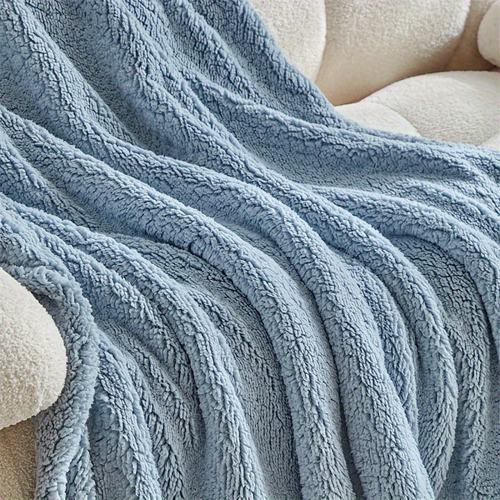 Ultra soft sherpa fleece blanket, warm & cozy for luxurious home comfort.