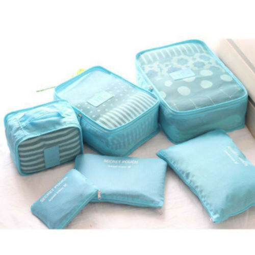Complete 12-piece unisex packing set, simplifying travel organization and maximizing suitcase capacity.