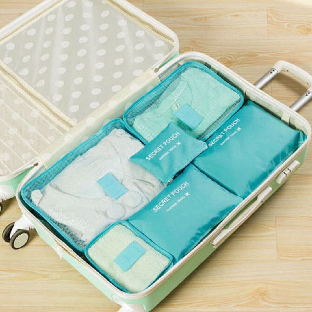 Versatile 12-piece travel storage cube set for organized clothes, shoes & accessories in luggage.