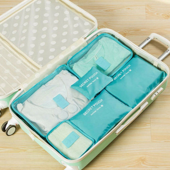 Versatile 12-piece travel storage cube set for organized clothes, shoes & accessories in luggage.
