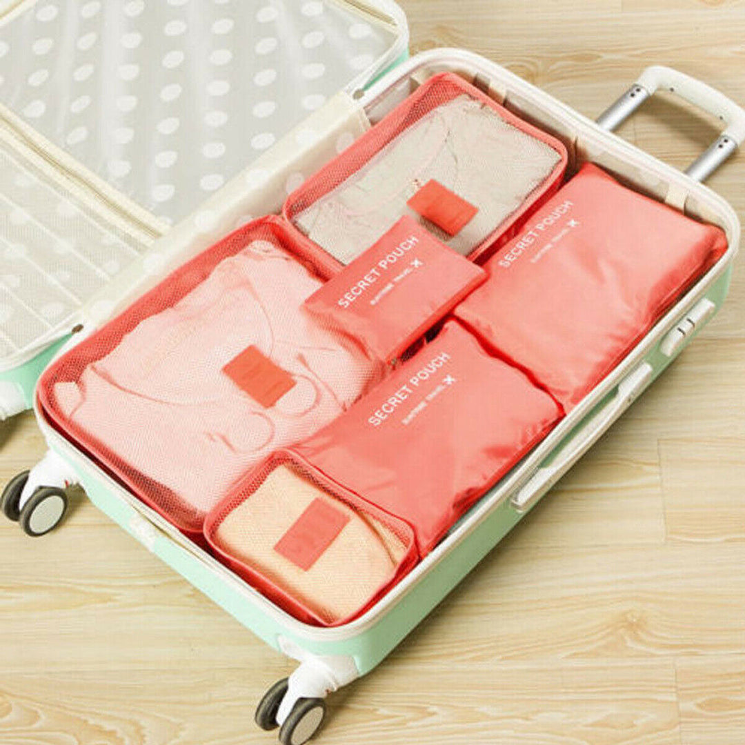 The ultimate 12-piece unisex travel packing solution, offering space-saving and organization for any trip.